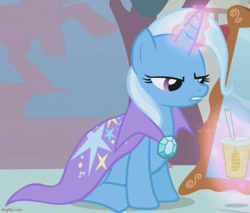 Size: 666x567 | Tagged: safe, screencap, trixie, pony, unicorn, boast busters, g4, season 1, brooch, cape, clothes, cropped, cup, drinking straw, female, frown, glowing, glowing horn, horn, jewelry, magic, magic aura, mare, sitting, teeth, telekinesis, trixie's brooch, trixie's cape