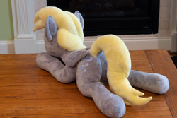 Size: 1280x854 | Tagged: safe, artist:azgchip, derpy hooves, pegasus, pony, g4, commission, dock, female, irl, lying down, mare, photo, plushie, rear view, solo, tail