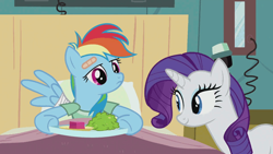 Size: 768x432 | Tagged: safe, screencap, rainbow dash, rarity, pegasus, pony, unicorn, g4, read it and weep, season 2, bandaid, bed, duo, duo female, female, frown, horn, looking at something, mare, on bed, smiling, wings