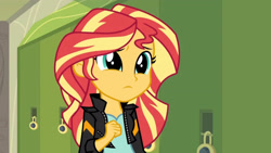 Size: 3410x1920 | Tagged: safe, screencap, sunset shimmer, human, equestria girls, g4, my little pony equestria girls: friendship games, canterlot high, clothes, corridor, cute, female, frown, high res, indoors, jacket, leather, leather jacket, lockers, sad, sadorable, shimmerbetes, solo