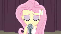 Size: 3410x1920 | Tagged: safe, screencap, fluttershy, human, acadeca, equestria girls, g4, my little pony equestria girls: friendship games, bare shoulders, clothes, eyes closed, female, hairpin, high res, microphone, sleeveless, solo, tank top