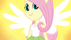 Size: 3410x1920 | Tagged: safe, screencap, fluttershy, equestria girls, g4, my little pony equestria girls: friendship games, bare shoulders, clothes, female, high res, lip bite, ponied up, sleeveless, smiling, solo, spread wings, tank top, transformation, wings