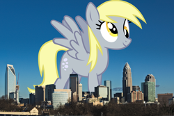 Size: 1920x1282 | Tagged: safe, artist:freak0uo, artist:thegiantponyfan, derpy hooves, pegasus, pony, g4, charlotte, derp, derpyzilla, female, giant derpy hooves, giant pegasus, giant pony, giantess, highrise ponies, irl, macro, mare, mega giant, north carolina, photo, ponies in real life, smiling, spread wings, walking, wings