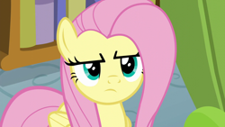 Size: 1280x720 | Tagged: safe, screencap, fluttershy, pegasus, pony, flutter brutter, g4, ambiguous kawmotion, disappointed, female, flutterbitch, fluttershy is not amused, frown, mare, narrowed eyes, solo, unamused