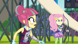 Size: 3410x1920 | Tagged: safe, screencap, fluttershy, sour sweet, equestria girls, g4, my little pony equestria girls: friendship games, archery, duo, duo female, eyeshadow, female, grin, hairpin, high res, makeup, sleeveless, smiling