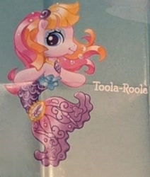 Size: 242x286 | Tagged: safe, toola-roola, earth pony, mermaid, merpony, pony, g3, g3.5, official, bangs, blue eyeshadow, eyeshadow, fish tail, jewelry, low quality, lowres, makeup, mermaid tail, mermaidized, name tag, necklace, paintbrush, solo, species swap, tail