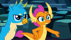 Size: 1920x1080 | Tagged: safe, screencap, gallus, smolder, dragon, griffon, g4, uprooted, dragoness, duo, female, gallus is not amused, hand on hip, male, raised eyebrow, smolder is not amused, unamused