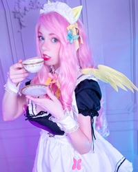 Size: 1080x1350 | Tagged: safe, fluttershy, human, g4, clothes, cosplay, costume, cup, fluttermaid, irl, irl human, maid, photo, solo, teacup