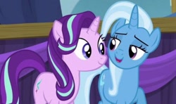Size: 640x380 | Tagged: safe, screencap, starlight glimmer, trixie, pony, unicorn, no second prances, season 6, cropped, duo, duo female, female, horn, lesbian, lidded eyes, looking at someone, mare, open mouth, open smile, shipping, smiling, startrix