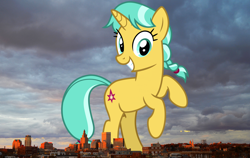Size: 2268x1434 | Tagged: safe, artist:cheezedoodle96, artist:thegiantponyfan, edit, citrine spark, fire quacker, pony, unicorn, g4, bipedal, female, friendship student, giant pony, giant unicorn, giantess, grin, highrise ponies, irl, leaning, looking at you, macro, mare, mega giant, photo, ponies in real life, providence, rhode island, smiling, story included