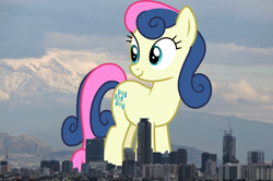 Size: 1280x848 | Tagged: safe, artist:cloudy glow, artist:thegiantponyfan, bon bon, sweetie drops, earth pony, pony, g4, background pony, female, giant bon bon (sweetie drops), giant pony, giant/macro earth pony, giantess, highrise ponies, irl, looking back, macro, mare, mega bon bon, mega giant, mexico, mexico city, photo, ponies in real life, smiling, standing