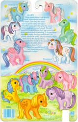 Size: 2229x3500 | Tagged: safe, applejack (g1), blossom, bow tie (g1), bubbles (g1), cotton candy (g1), firefly, glory, medley, moondancer (g1), seashell (g1), sunbeam, twilight, g1, official, backcard, blushing, cloud, coat markings, facial markings, grass, group, high res, merchandise, rainbow, scan, sky, star (coat marking), text