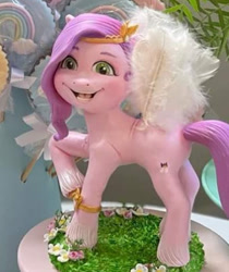 Size: 503x600 | Tagged: safe, pipp petals, pegasus, pony, g5, my little pony: a new generation, creepy, creepy smile, cursed image, face of mercy, faic, female, irl, jesus christ how horrifying, mare, nightmare fuel, photo, smiling, solo, statue, uncanny valley