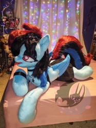 Size: 1497x2000 | Tagged: safe, artist:nerofledermaus, rainbow dash, g4, alternate hairstyle, bed, bedroom eyes, bracelet, clothes, goth, heart eyes, irl, jewelry, makeup, photo, piercing, plushie, solo, tongue out, wingding eyes