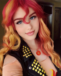 Size: 1440x1800 | Tagged: safe, artist:maddymoiselle, edit, editor:sammykun, faceapp, sunset shimmer, human, equestria girls, g4, beautiful, bust, clothes, cosplay, costume, cutie mark, eyelashes, female, gold, humanized, irl, irl human, jacket, jewelry, leather jacket, lipstick, looking at you, makeup, necklace, photo, photography, portrait, redhead, solo, wig, woman