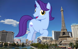 Size: 3072x1932 | Tagged: safe, artist:cheezedoodle96, artist:thegiantponyfan, edit, november rain, pony, unicorn, g4, friendship student, giant pony, giant unicorn, high res, highrise ponies, irl, las vegas, looking at you, macro, male, mega giant, nevada, open mouth, photo, ponies in real life, raised hoof, smiling, smiling at you, solo, stallion