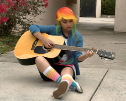 Size: 1392x1120 | Tagged: safe, artist:eri-nyan, rainbow dash, human, equestria girls, g4, 2015, clothes, cosplay, costume, guitar, irl, irl human, multicolored hair, musical instrument, photo, rainbow hair, solo