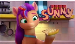 Size: 1080x638 | Tagged: safe, screencap, sunny starscout, earth pony, pony, g5, my little pony: make your mark, my little pony: make your mark chapter 1, spoiler:my little pony: make your mark, female, food, kitchen, mane stripe sunny, mare, pizza, solo, text