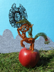 Size: 1680x2240 | Tagged: safe, artist:malte279, part of a set, applejack, earth pony, pony, g4, apple, cowboy hat, craft, female, food, grass, hat, hoof hold, irl, mare, photo, rearing, solo, stetson, wire sculpture