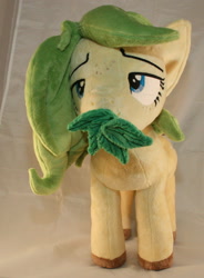 Size: 1580x2144 | Tagged: safe, artist:bastler, oc, oc only, oc:nettle vienna, earth pony, pony, female, irl, leaves, mare, photo, plushie