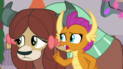 Size: 1280x720 | Tagged: safe, screencap, smolder, yona, dragon, yak, g4, season 8, the hearth's warming club, about to say something, about to talk, dragoness, duo, duo female, fangs, female, i have several questions, implied gallus, open mouth, raised finger