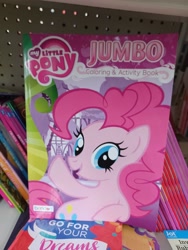 Size: 3000x4000 | Tagged: safe, pinkie pie, earth pony, pony, coloring book, dollar tree, error, female, high res, irl, mare, my little pony jumbo coloring book, my little pony logo, open mouth, open smile, photo, raised hoof, smiling, solo