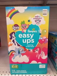 Size: 3024x4032 | Tagged: safe, pinkie pie, rainbow dash, rarity, spike, dragon, earth pony, pegasus, pony, unicorn, g4, balloon, diaper, merchandise, pampers, pampers easy ups, photo, pullup (diaper), training underwear