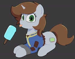Size: 2694x2115 | Tagged: safe, artist:ponconcarnal, oc, oc only, oc:littlepip, pony, unicorn, fallout equestria, :p, clothes, cute, female, food, gray background, high res, horn, ice cream, jumpsuit, looking at you, lying down, mare, popsicle, prone, simple background, sitting, smiling, solo, tail, tongue out, vault suit