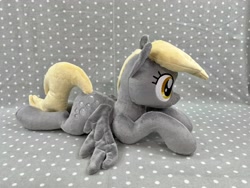 Size: 4032x3024 | Tagged: safe, artist:kazzysart, derpy hooves, pony, g4, irl, lying down, photo, plushie, prone, solo
