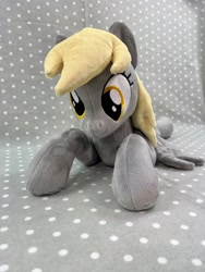 Size: 3024x4032 | Tagged: safe, artist:kazzysart, derpy hooves, pony, g4, irl, lying down, photo, plushie, prone, solo