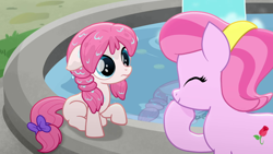 Size: 1280x720 | Tagged: safe, screencap, tulip bulb, tulip rose, earth pony, pony, g4, my little pony: rainbow roadtrip, background pony, bow, cute, female, filly, floppy ears, foal, fountain, hope hollow, mare, mother and child, mother and daughter, raised hoof, tail, tail bow, wet, wet mane