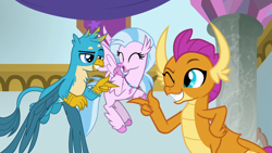 Size: 1280x720 | Tagged: safe, screencap, gallus, silverstream, smolder, classical hippogriff, dragon, griffon, hippogriff, g4, season 9, she's all yak, ^^, cute, diastreamies, dragoness, eyes closed, female, finger gun, finger guns, flying, looking at each other, looking at someone, male, pointing at each other, shipping fuel, smiling, trio