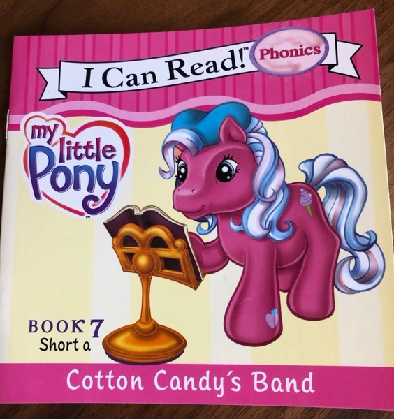 2893460 - safe, artist:ken edwards, cotton candy (g3), earth pony, pony,  g3, official, beret, book, cotton candy's band, cover, female, food, hat,  heart, heart eyes, i can read, ice cream, irl, mare