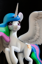 Size: 4000x6000 | Tagged: safe, artist:shuxer59, princess celestia, alicorn, pony, g4, absurd resolution, black background, female, figurine, hooves, horn, mare, photo, photography, simple background, smiling, solo, spread wings, statue, wings