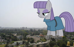 Size: 1024x656 | Tagged: safe, artist:fruft, artist:thegiantponyfan, maud pie, earth pony, pony, g4, female, giant pony, giant/macro earth pony, giantess, highrise ponies, irl, looking down, macro, mare, mega giant, nigeria, photo, ponies in real life