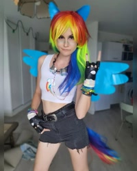 Size: 1080x1352 | Tagged: safe, artist:mayamystique, rainbow dash, human, g4, bare shoulders, clothes, cosplay, costume, devil horn (gesture), irl, irl human, multicolored hair, photo, rainbow hair, sleeveless, solo, tank top
