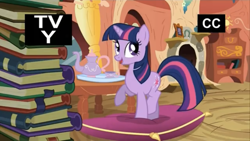 Size: 1334x750 | Tagged: safe, screencap, twilight sparkle, pony, unicorn, g4, season 3, spike at your service, book, female, golden oaks library, mare, open mouth, open smile, pillow, smiling, solo, standing on two hooves, table, tv rating, tv-y, unicorn twilight