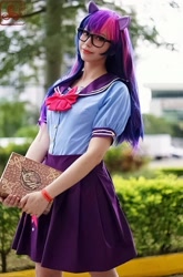 Size: 711x1080 | Tagged: safe, artist:flutterbutter cosplay, twilight sparkle, human, g4, book, book of harmony, clothes, cosplay, costume, glasses, irl, irl human, photo
