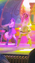 Size: 204x367 | Tagged: safe, edit, fluttershy, rarity, human, equestria girls, g4, my little pony & equestria girls el show en vivo, animated, ass, butt, clothes, cropped, dancing, dancity, duo, gif, irl, irl human, legs, live action, panties, panty shot, skirt, underwear, upskirt, white underwear