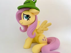 Size: 1280x960 | Tagged: safe, artist:sparkle40559933, fluttershy, frog, pegasus, pony, g4, craft, hat, photo, sculpture, smiling, solo, spread wings, wings