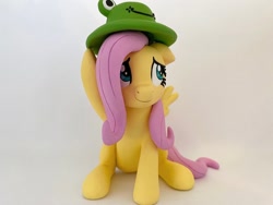 Size: 1280x960 | Tagged: safe, artist:sparkle40559933, fluttershy, frog, pegasus, pony, g4, craft, hat, photo, sculpture, smiling, solo, spread wings, wings
