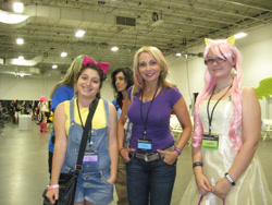 Size: 2828x2121 | Tagged: safe, artist:little-miss-aqua-xox, apple bloom, fluttershy, human, bronycon, bronycon 2012, g4, clothes, cosplay, costume, high res, irl, irl human, photo, tara strong, voice actor