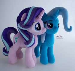 Size: 1600x1508 | Tagged: safe, artist:meplushyou, starlight glimmer, trixie, pony, unicorn, g4, duo, female, gray background, irl, mare, photo, plushie, simple background, smiling