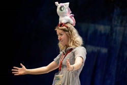 Size: 1065x712 | Tagged: safe, sweetie belle, human, galacon, galacon 2018, g4, claire corlett, convention, irl, irl human, photo, plushie, voice actor