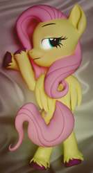 Size: 1556x2910 | Tagged: safe, artist:kamimation, fluttershy, pegasus, pony, g4, 3d, bed, bedroom eyes, blender, blender cycles, body pillow, body pillow design, crossed hooves, flank, folded wings, glowing, glowing eyes, hooves, looking at you, looking back, looking back at you, lying down, lying on bed, on bed, prone, raised eyebrow, smug, solo, tail, tail wrap, unshorn fetlocks, wings