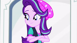 Size: 3410x1920 | Tagged: safe, screencap, starlight glimmer, human, equestria girls, equestria girls specials, g4, my little pony equestria girls: mirror magic, beanie, crossed arms, female, hat, high res, smiling, solo, statue