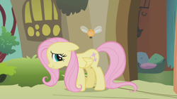 Size: 1000x563 | Tagged: safe, screencap, fluttershy, parasprite, pegasus, pony, g4, my little pony: friendship is magic, season 1, swarm of the century, doorway, embarrassed, female, floppy ears, fluttershy's cottage, flying, mare, pillow, solo