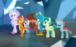 Size: 626x387 | Tagged: safe, screencap, gallus, ocellus, sandbar, silverstream, smolder, yona, changedling, changeling, classical hippogriff, dragon, earth pony, griffon, hippogriff, pony, yak, g4, what lies beneath, bow, cloven hooves, colored hooves, cropped, dragoness, female, hair bow, jewelry, male, monkey swings, necklace, student six, teenager