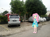 Size: 1280x959 | Tagged: safe, artist:mazakbar567, edit, fluttershy, human, equestria girls, g4, car, clothes, dress, equestria girls in real life, female, indonesia, indonesian, irl, looking at you, photo, simple background, smiling, smiling at you, solo, street, toyota, toyota avanza, toyota kijang