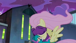 Size: 1912x1076 | Tagged: safe, screencap, fluttershy, saddle rager, pegasus, pony, g4, power ponies (episode), season 4, beautiful, eyes closed, female, mare, power ponies, solo